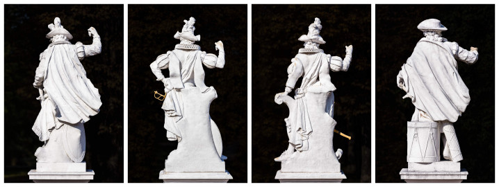 Schloss Bruchsal - Schlossterrasse, Westseite / Schlossgarten, Ostseite - 1. bis 4. Skulptur von Süden - Blick von der Terrasse auf die vier "Hellebardiere", als "Wächter" des Schlosses (gehauen von Joachim Günther, 1758 bis 1763) (aufgenommen im September 2018, am späten Vormittag) Schloss Bruchsal - Schlossterrasse, Westseite / Schlossgarten, Ostseite - 1. bis 4. Skulptur von Süden - Blick von der Terrasse auf die vier "Hellebardiere", als "Wächter" des Schlosses (gehauen von Joachim Günther, 1758 bis 1763) (aufgenommen im September 2018, am späten Vormittag)