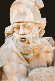 Schloss Bruchsal - Garten - Hauptachse, Südseite, 2. Skulptur von Osten - Kopf der Skulptur "Der Winter" aus dem Skulpturenensemble "Vier Jahreszeiten" (Kopie; Original gehauen 1759 von Joachim Günther, befindet sich im Harvard Art Museum / Fogg Museum) (aufgenommen im September 2018, am späten Vormittag)