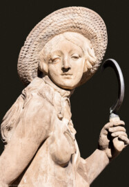 Schloss Bruchsal - Garten - Hauptachse, Nordseite, 1. Skulptur von Osten - Kopf der Skulptur "Der Sommer" aus dem Skulpturenensemble "Vier Jahreszeiten" (Kopie; Original gehauen 1759 von Joachim Günther, befindet sich im Harvard Art Museum / Fogg Museum) (aufgenommen im September 2018, am späten Nachmittag)