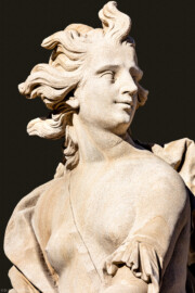 Schloss Bruchsal - Schlossgarten - Hauptachse, Nordseite, 4. Skulptur von Osten - Kopf der Skulptur "Das Feuer" aus dem Skulpturenensemble "Vier Elemente" (Kopie von Hans Volker Dursy; Original gehauen 1761 von Joachim Günther, befindet sich im Gartensaal des Hauptbaus) (aufgenommen im September 2018, am späten Nachmittag)
