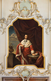 Schloss Bruchsal - Hauptbau / Corps de Logis - Beletage - Fürstensaal - Nordseite, Westen - Blick von Süden auf das Portrait von Lothar Friedrich von Metternich-Burscheid (1652 bis 1675 Bischof von Speyer) (ursprünglich gemalt von Johannes Zick, um 1753; rekonstruiert von Walter Maschke, 1973 bis 1974) (aufgenommen im Juni 2019, am späten Vormittag)