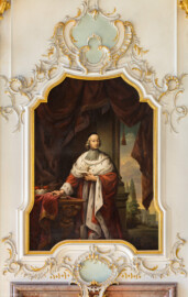 Schloss Bruchsal - Hauptbau / Corps de Logis - Beletage - Fürstensaal - Südseite, Westen - Blick von Norden auf das Portrait von Johann VIII. Hugo von Orsbeck (1675 bis 1711 Bischof von Speyer) (ursprünglich gemalt von Johannes Zick, um 1753; rekonstruiert von Walter Maschke, 1973 bis 1974) (aufgenommen im Juni 2019, am späten Vormittag)