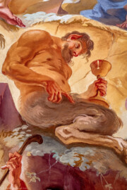 Schloss Bruchsal - Hauptbau / Corps de Logis - Beletage - Marmorsaal / Kaisersaal - Deckenfresko, äußere Zone, nordöstlich des Zentrums - Von Südwesten - Ausschnitt aus dem Ewigen Göttermahl im Olymp - Darstellung eines zechenden Satyrs (Deckenfresko urspünglich gemalt 1754 von Johannes Zick, originalgetreu rekonstruiert 1971 bis 1974 von Wolfram Köberl; Stuck urspünglich von Johann Michael Feuchtmayer dem Jüngeren, rekonstruiert 1962 bis 1969 von Jakob und Josef Schnitzer) (aufgenommen im Januar 2020, am Nachmittag) Schloss Bruchsal - Hauptbau / Corps de Logis - Beletage - Marmorsaal / Kaisersaal - Deckenfresko, äußere Zone, nordöstlich des Zentrums - Von Südwesten - Ausschnitt aus dem Ewigen Göttermahl im Olymp - Darstellung eines zechenden Satyrs (Deckenfresko urspünglich gemalt 1754 von Johannes Zick, originalgetreu rekonstruiert 1971 bis 1974 von Wolfram Köberl; Stuck urspünglich von Johann Michael Feuchtmayer dem Jüngeren, rekonstruiert 1962 bis 1969 von Jakob und Josef Schnitzer) (aufgenommen im Januar 2020, am Nachmittag)