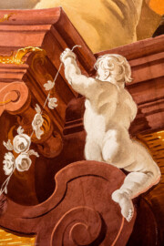Schloss Bruchsal - Hauptbau / Corps de Logis - Beletage - Fürstensaal - Decke, äußere Zone, Südwestecke - Ausschnitt aus der südwestlichen äußeren Zone - Scheinarchitektur mit Putto (Deckenfresko urspünglich gemalt 1751 von Johannes Zick, originalgetreu rekonstruiert 1966 bis 1969 von Wolfram Köberl) (aufgenommen im Januar 2020, am späten Vormittag)