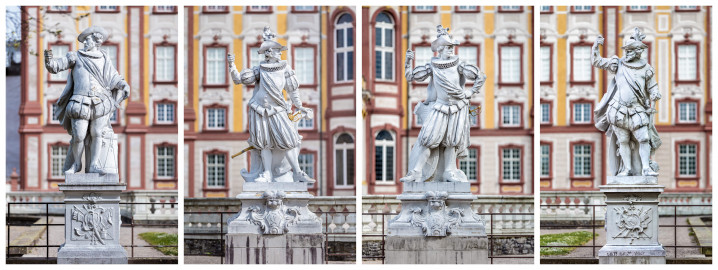 Schloss Bruchsal - Schlossterrasse - Westseite / Schlossgarten - Von Westen - 1. bis 4. Skulptur von Norden - Blick von der Hauptachse des Gartens nach Osten auf die vier "Hellebardiere", als "Wächter" des Schlosses (gehauen von Joachim Günther, 1758 bis 1763) (aufgenommen im April 2020, am Nachmittag) Schloss Bruchsal - Schlossterrasse - Westseite / Schlossgarten - Von Westen - 1. bis 4. Skulptur von Norden - Blick von der Hauptachse des Gartens nach Osten auf die vier "Hellebardiere", als "Wächter" des Schlosses (gehauen von Joachim Günther, 1758 bis 1763) (aufgenommen im April 2020, am Nachmittag)