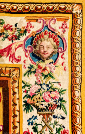 Schloss Bruchsal - Hauptbau / Corps de Logis - Von innen - Beletage - Jagdzimmer - Nördliche Wand, Westseite - Ausschnitt aus der Bordüre (rechte ober Ecke) der Tapisserie "Musikanten" aus der "Groteskenserie" (Inv.Nr. G 104; Höhe x Breite: 335 cm x 205 cm; hergestellt in der Werkstatt von Philippe Behagle (Vater oder Sohn) in Beauvais zwischen 1685 und 1719; Entwürfe von Jean-Baptiste Monnoyer, Guy-Louis de Vernansal, Jean-Baptiste B(e)lin de Fontenay; restauriert 1960 und nach 2007) (aufgenommen im Februar 2021, am späten Vormittag) Schloss Bruchsal - Hauptbau / Corps de Logis - Von innen - Beletage - Jagdzimmer - Nördliche Wand, Westseite - Ausschnitt aus der Bordüre (rechte ober Ecke) der Tapisserie "Musikanten" aus der "Groteskenserie" (Inv.Nr. G 104; Höhe x Breite: 335 cm x 205 cm; hergestellt in der Werkstatt von Philippe Behagle (Vater oder Sohn) in Beauvais zwischen 1685 und 1719; Entwürfe von Jean-Baptiste Monnoyer, Guy-Louis de Vernansal, Jean-Baptiste B(e)lin de Fontenay; restauriert 1960 und nach 2007) (aufgenommen im Februar 2021, am späten Vormittag)