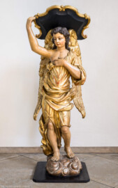 Bruchsal - Peterskirche / St. Peter - Westliches Querschiff, Südseite - Blick auf einen Lesepult mit einer Engelsfigur (aufgenommen im Juni 2022, am Nachmittag, nach der Renovierung) Bruchsal - Peterskirche / St. Peter - Westliches Querschiff, Südseite - Blick auf einen Lesepult mit einer Engelsfigur (aufgenommen im Juni 2022, am Nachmittag, nach der Renovierung)