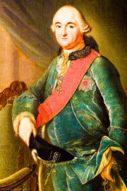 Schloss und Schlossgarten Schwetzingen - Schloss - Mittelbau - Von innen - 1. Obergeschoss - Appartment des Kurfürsten - Kabinett - Südwand, westliche Seite - Ausschnitt aus dem Porträt von Kurfürst Carl Theodor (1724-1799, reg. 1742-1799); gekleidet in einen grünen Samtanzug, gegen einen Sessel gelehnt; mit dem Schärpenband und dem Bruststern des Ordens des Heiligen Hubertus (kurz Hubertusorden) mit der Abkürzung der Ordensdevise "In Treue fest" als Inschrift; auf der Brust der Orden vom Pfälzer Löwen (kurz Löwenorden), gestiftet 1768 von Carl Theodor einen Tag nach Vollendung seines 25-jährigen Regierungsjubiläums (Maler: Johann Peter Hoffmeister (1740-1772), Datierung: um 1770) (aufgenommen im Januar 2024, am späten Vormittag) Schloss und Schlossgarten Schwetzingen - Schloss - Mittelbau - Von innen - 1. Obergeschoss - Appartment des Kurfürsten - Kabinett - Südwand, westliche Seite - Ausschnitt aus dem Porträt von Kurfürst Carl Theodor (1724-1799, reg. 1742-1799); gekleidet in einen grünen Samtanzug, gegen einen Sessel gelehnt; mit dem Schärpenband und dem Bruststern des Ordens des Heiligen Hubertus (kurz Hubertusorden) mit der Abkürzung der Ordensdevise "In Treue fest" als Inschrift; auf der Brust der Orden vom Pfälzer Löwen (kurz Löwenorden), gestiftet 1768 von Carl Theodor einen Tag nach Vollendung seines 25-jährigen Regierungsjubiläums (Maler: Johann Peter Hoffmeister (1740-1772), Datierung: um 1770) (aufgenommen im Januar 2024, am späten Vormittag)