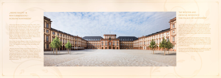 Schloss und Schlossgarten Schwetzingen - Schloss - Mittelbau - Von innen - Erdgeschoss, Nordseite - Besucherzentrum / ehemaliger Hochkeller - Tafel „Meine Haupt- & Winterresidenz - Schloss Mannheim” (angebracht gegenüber der Tür zum nördlichen Treppenhaus) (Mittelbau: Länge Westseite ca. 45 Meter, Breite Süd-/Nordseite ca. 38 Meter; Wiederaufbau / Erweiterung: 1698-1717; Architekt: Johann Adam Breunig) (aufgenommen im November 2025, am späten Vormittag)