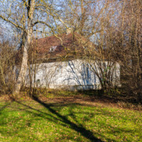 Schloss und Schlossgarten Schwetzingen - Garten - Baumschule am Schwarzen Meerle - Nordwestecke - Von Süden - Blick auf das Gärtnerhaus der Baumschule (Gärtnerhaus: Länge x Breite: ca. 15 x 10 Meter; Bauzeit: vermutlich nach 1778; Architekt: vermutlich Nicolas de Pigage) (aufgenommen im Januar 2024, am Vormittag)
